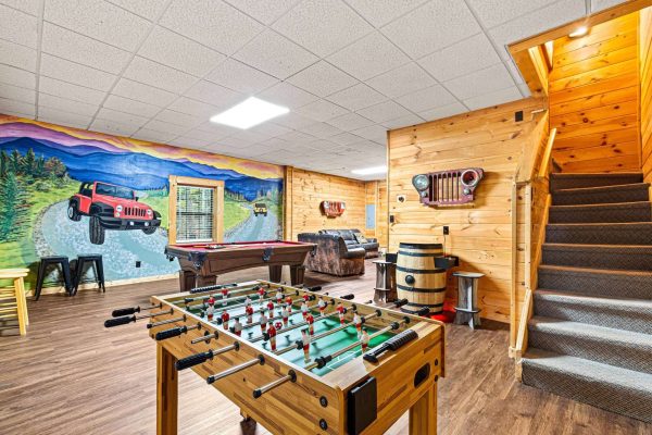 Jeep mural, foosball, Pool Table, Arcade